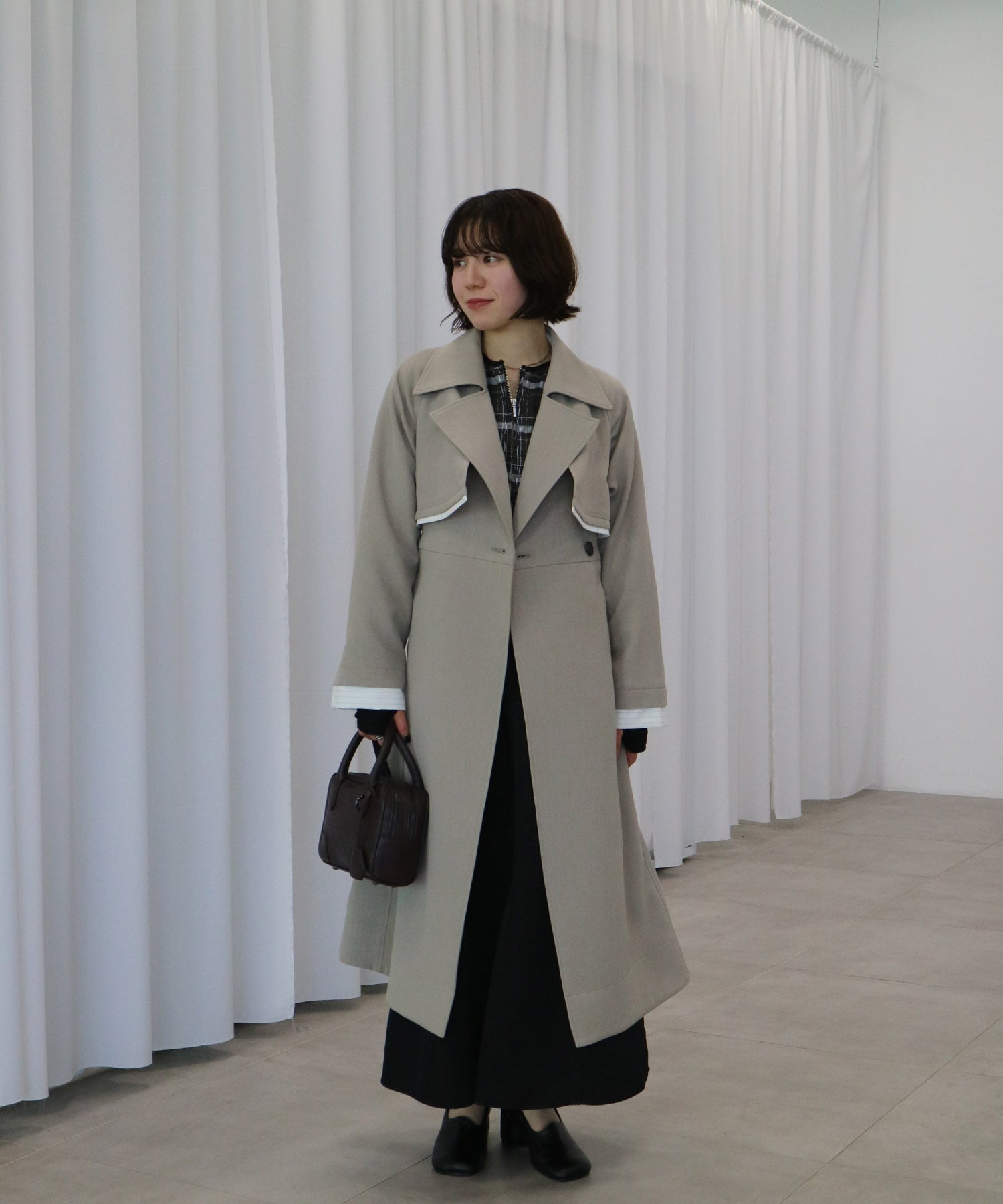 レイヤーディテールトレンチコート
