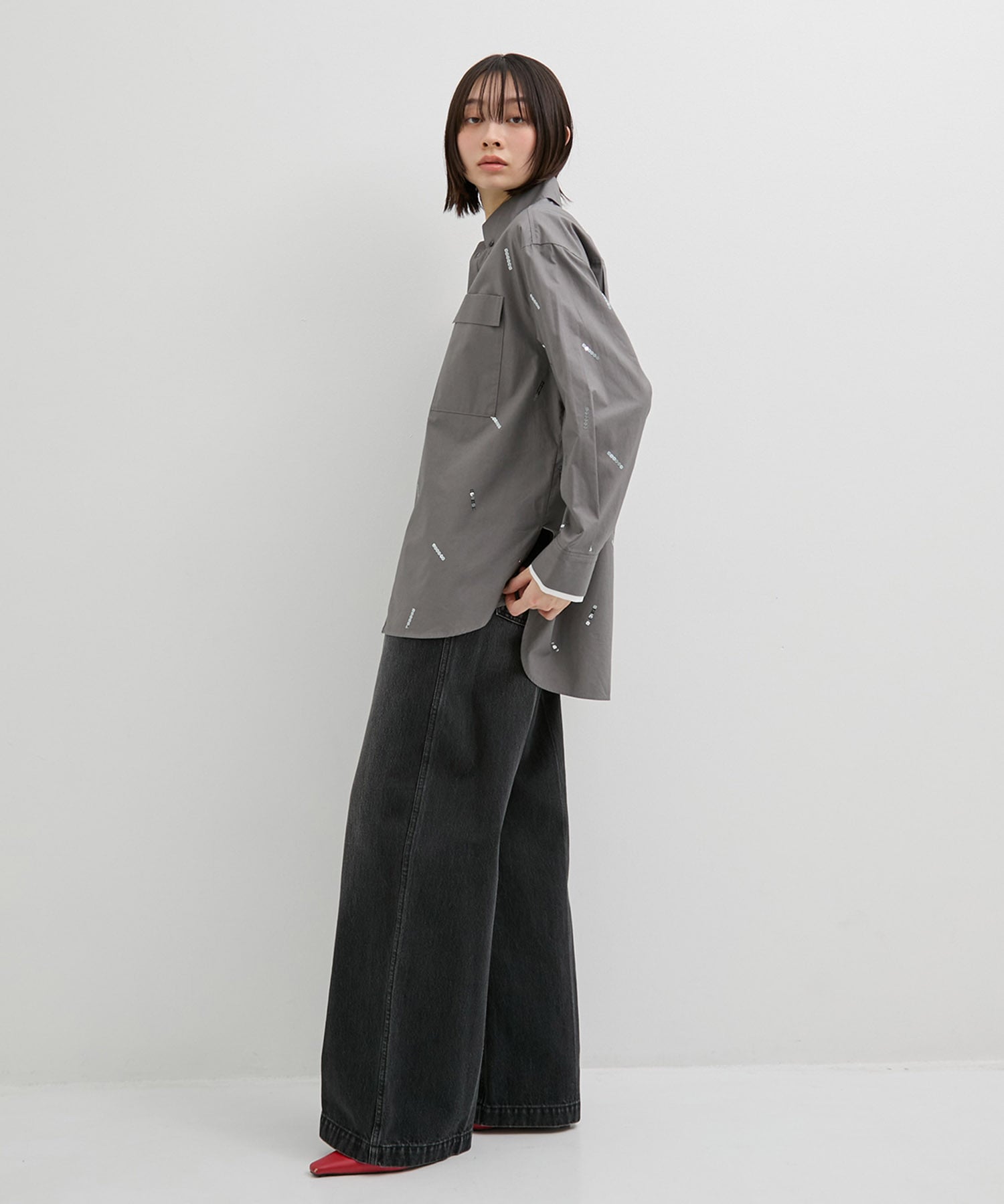 レイヤーカフススパンコールオーバーシャツ