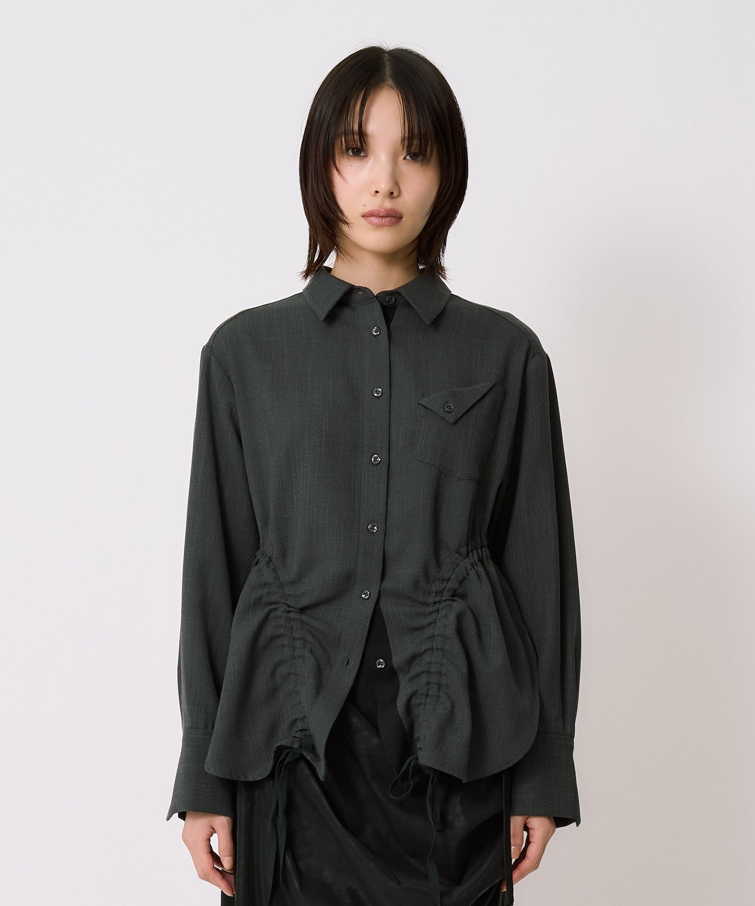ドロストペプラムシャツ