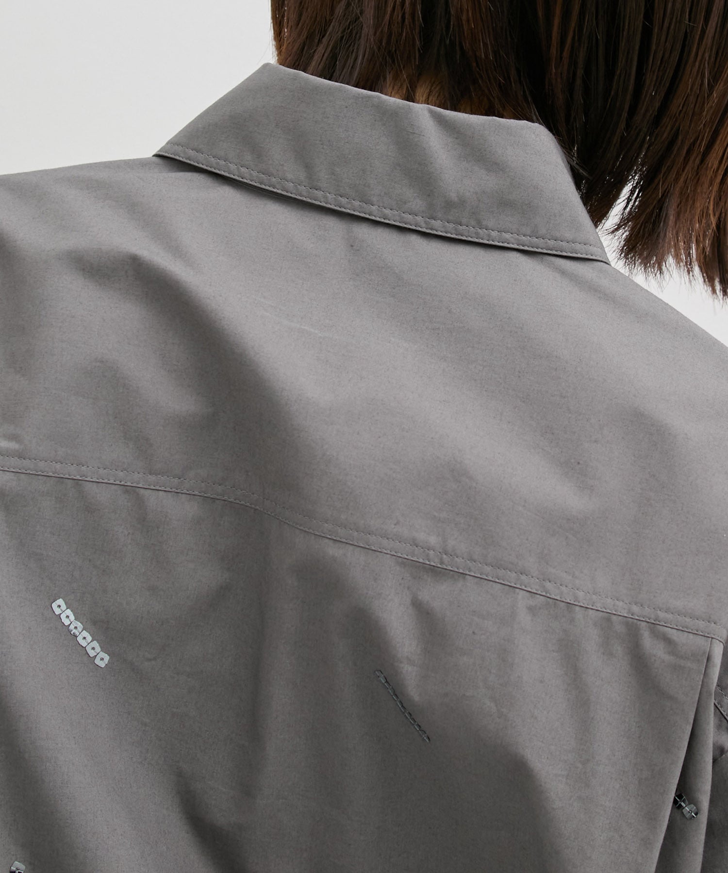 レイヤーカフススパンコールオーバーシャツ